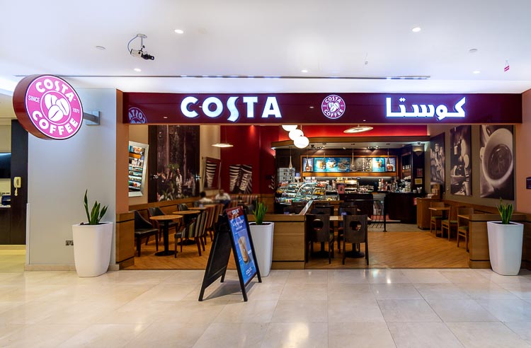 Seating at Costa Coffee shop at Premier Inn Abu Dhabi International Airport hotel