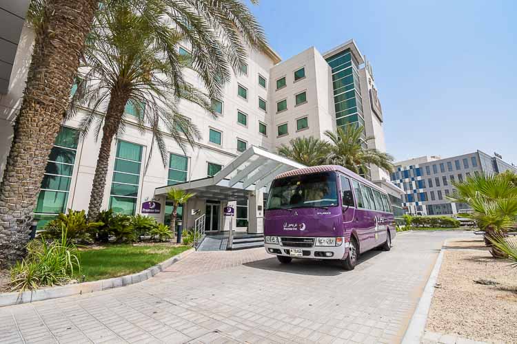 Shuttle bus outside PRemier Inn Dubai Investments Park hotel near Expo 2020