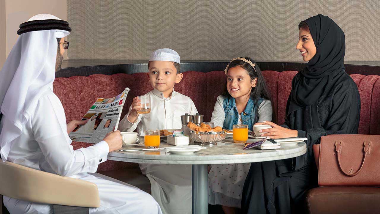 image of family having lunch at premier inn doha hotel