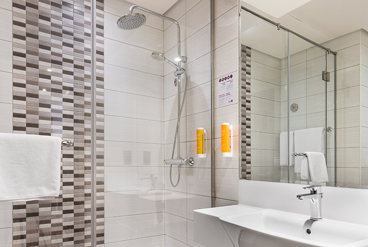 Private ensuite bathroom with large shower at Premier Inn hotels