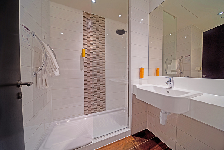 Shower in ensuite bathroom in Premier Inn Dubai Al Jaddaf hotel