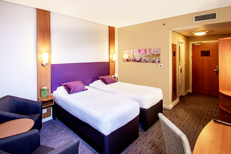 Twin bedroom at Premier Inn hotel in Abu Dhabi near ADNEC
