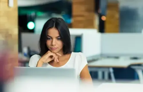 Women sitting and looking on laptop